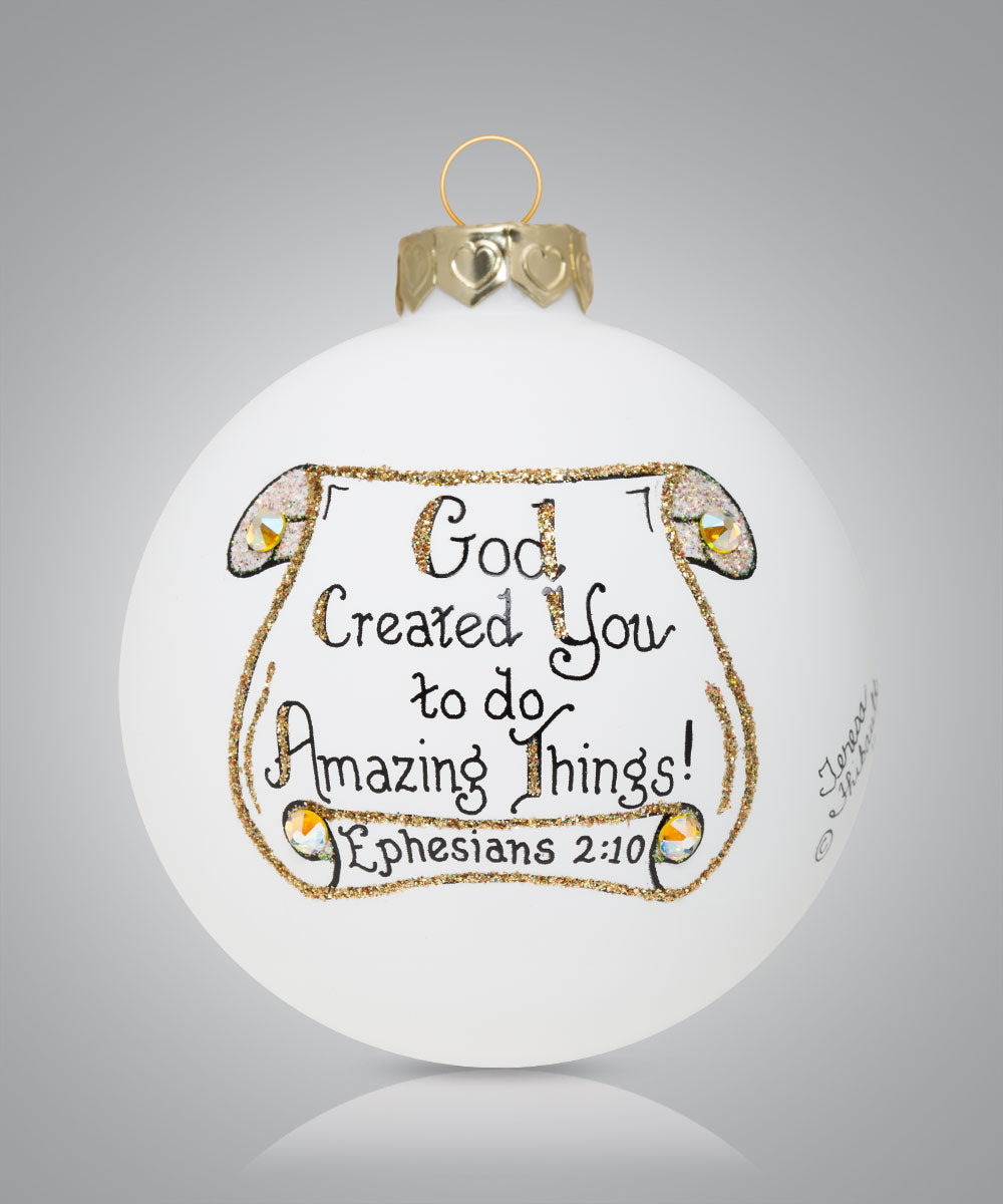 Hand-painted glass ornament with scroll design and scripture “God created you to do amazing things”
