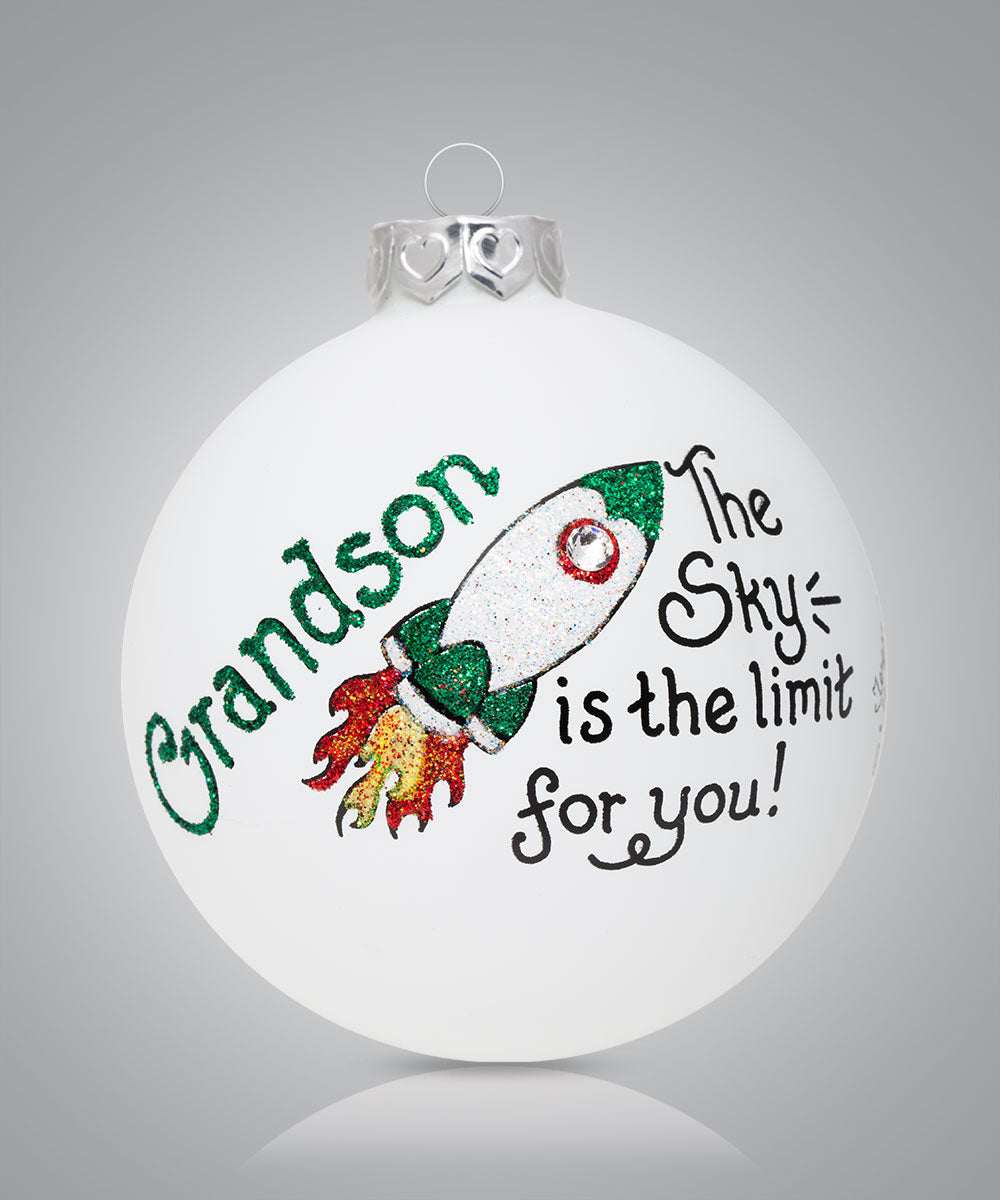 Hand-painted glass ornament with rocket and message for grandson: “The sky is the limit for you”