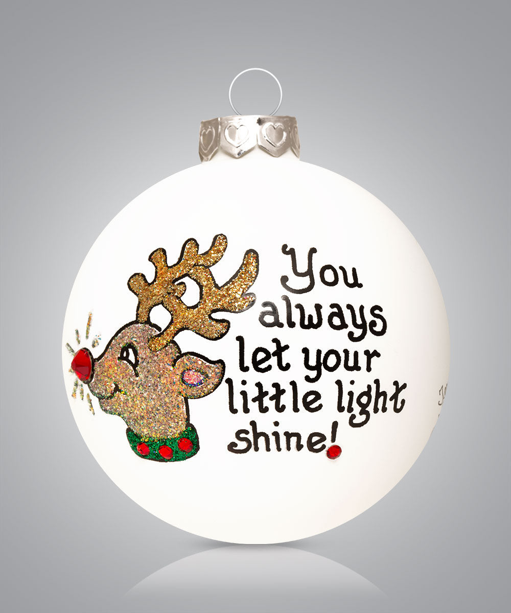 Hand-painted glass ornament with reindeer and message about letting your light shine