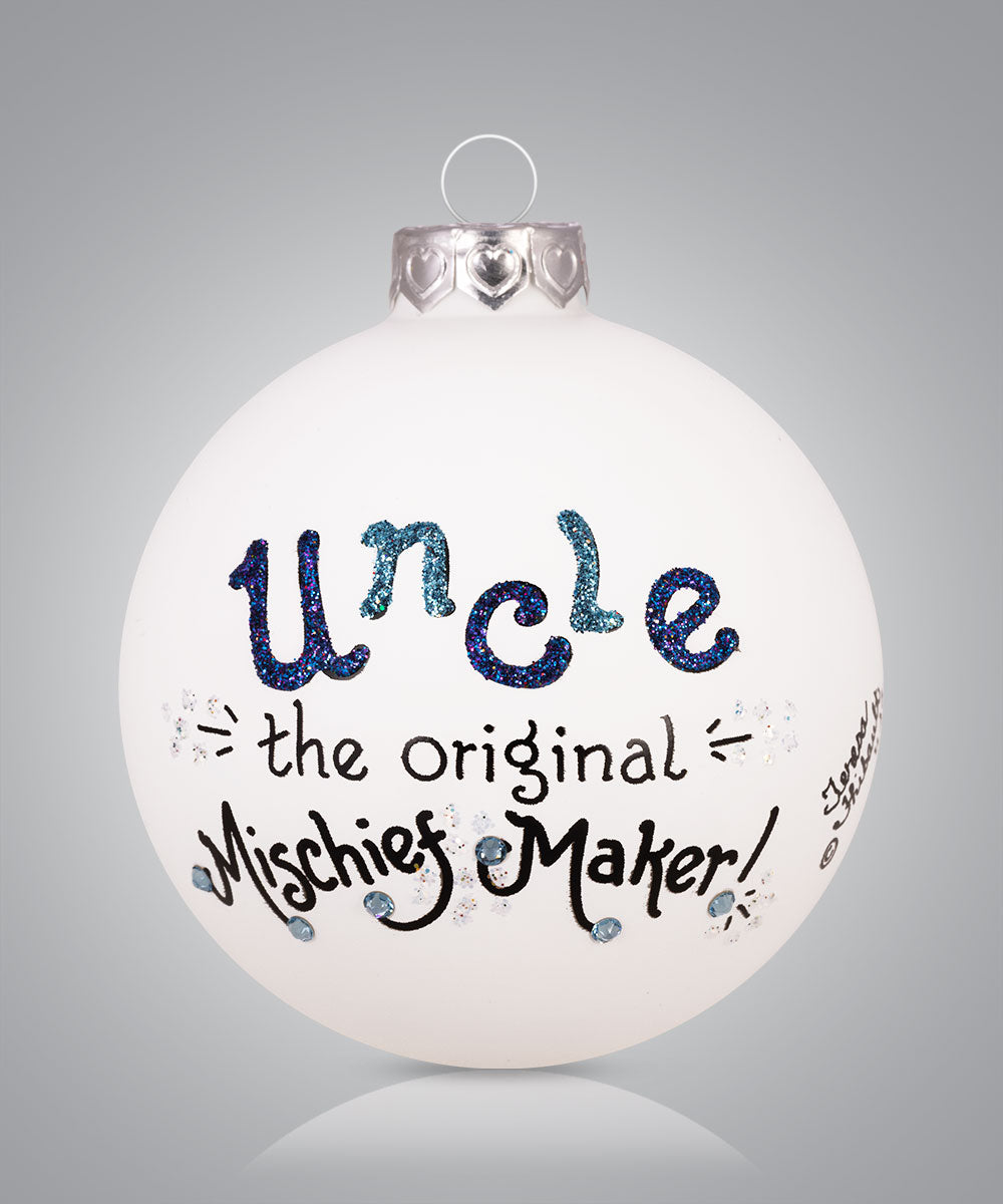 Hand-painted glass ornament with playful text calling uncle the original mischief maker
