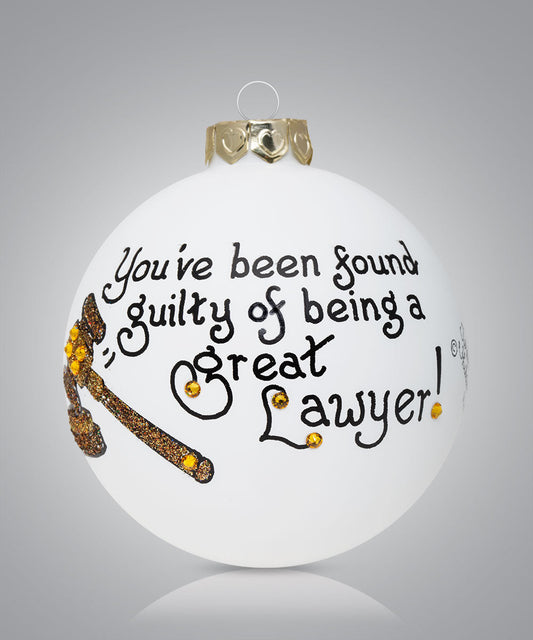 Hand-painted glass ornament with gavel and humorous message about being a great lawyer
