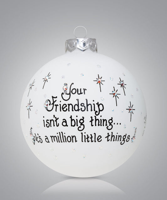 Hand-painted glass ornament with rocket and message “The sky is the limit for you”