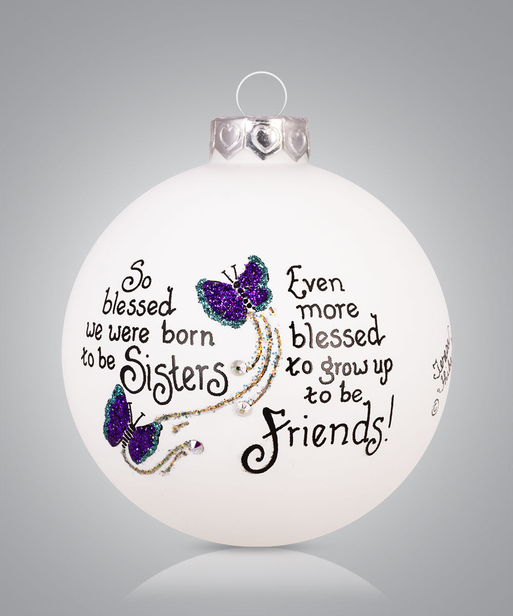 Hand-painted glass ornament with butterflies and sentiment about being blessed to be sisters and friends