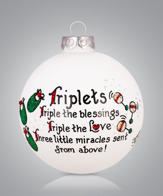 Hand-painted glass ornament for parents of triplets with baby rattles and phrase “Triple the blessings, triple the love”